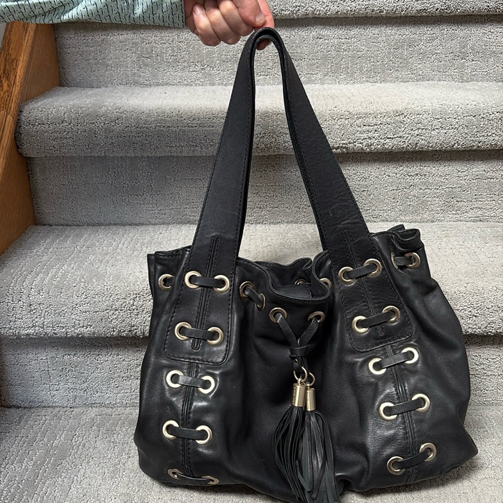 Michael Kors Astor Grommet Hobo style bag